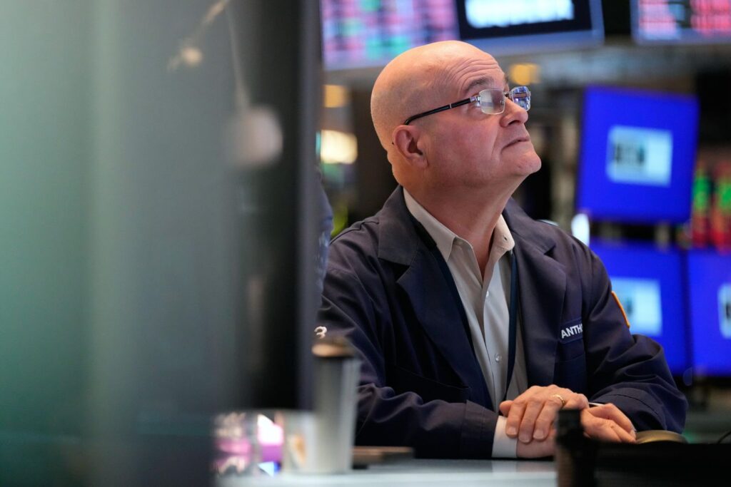 Wall Street holds steadier as oil prices stop surging, for now