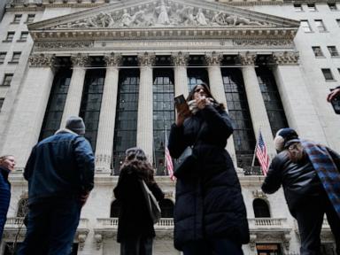 Asian shares surge, echoing rally on Wall Street as oil prices sank back to about $90