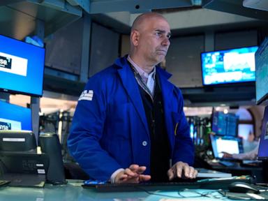 Stocks rally as oil prices fall back toward $100 on hopes for a possible end to the Iran war