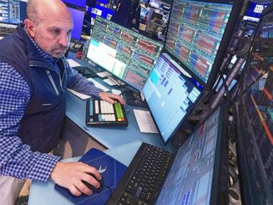 US stocks edge up toward more records as crude oil prices ease
