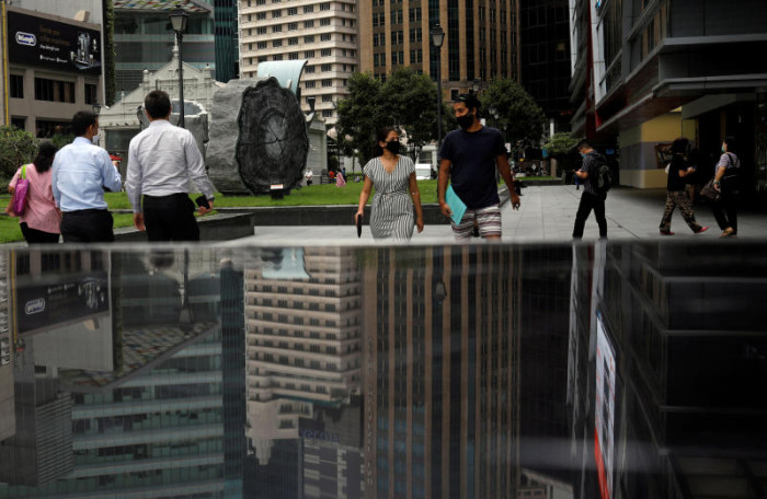 Singapore stocks hit record high; Asian FX subdued