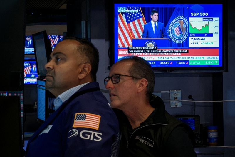 Nasdaq hits record as dollar and Treasury yields climb, oil prices ease