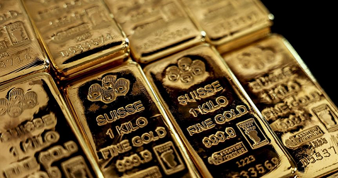 ‎Gold holds gains as dollar steadies; silver jumps 2%